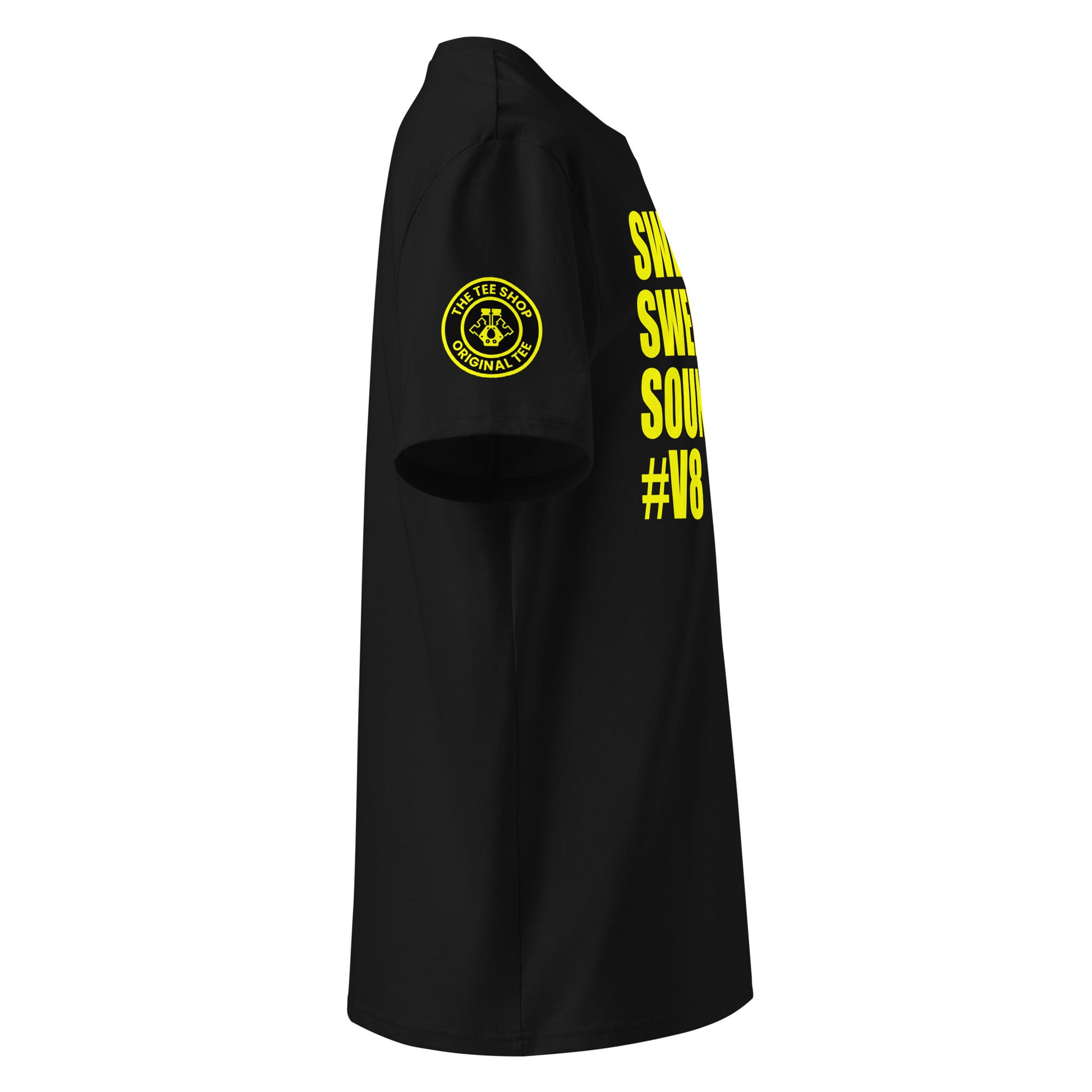 Right side view of black t-shirt showing The Tee Shop’s unique engine logo on the sleeve and edge of the yellow SWEET SWEET SOUNDS #V8 slogan. DTF print, car culture and engine tribute.