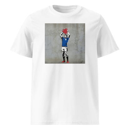 White unisex organic cotton t‑shirt with street-art style print of a St Mary’s RFC rugby hooker holding a red heart above his head, wearing a blue jersey with white star detail.