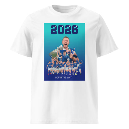 White unisex organic cotton t-shirt with front print reading “2026” above an illustrated St Marys rugby celebration scene with trophies and the text “WORTH THE WAIT”.