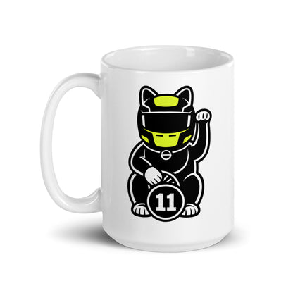 Glossy ceramic mug with a helmeted lucky cat in black kit and a #11 coin ideal for fans who love calm chaos and elite defending.