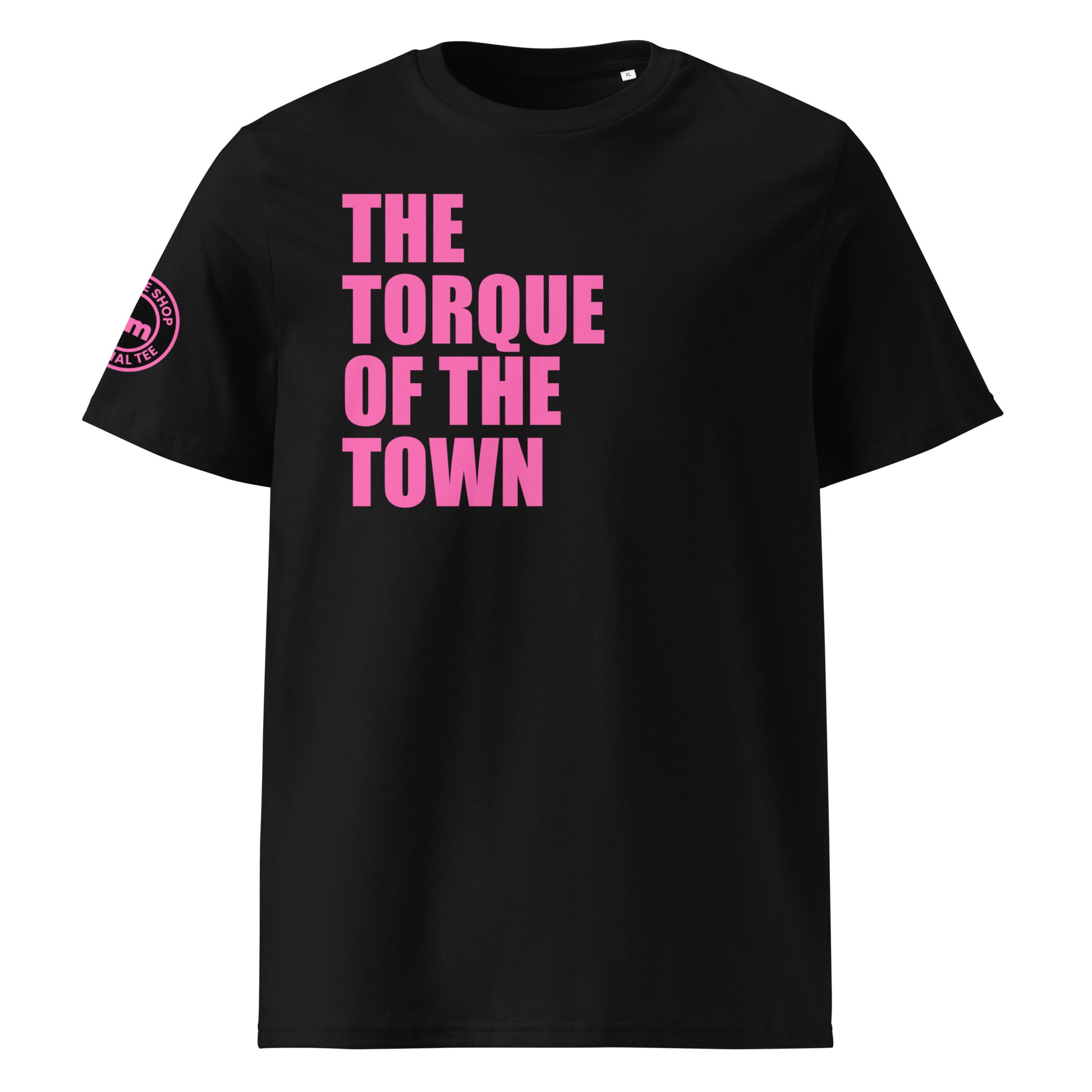 Front view of black unisex t-shirt with bold pink “THE TORQUE OF THE TOWN” slogan. DTF print, perfect for torque fans, car meets, and petrolhead banter.