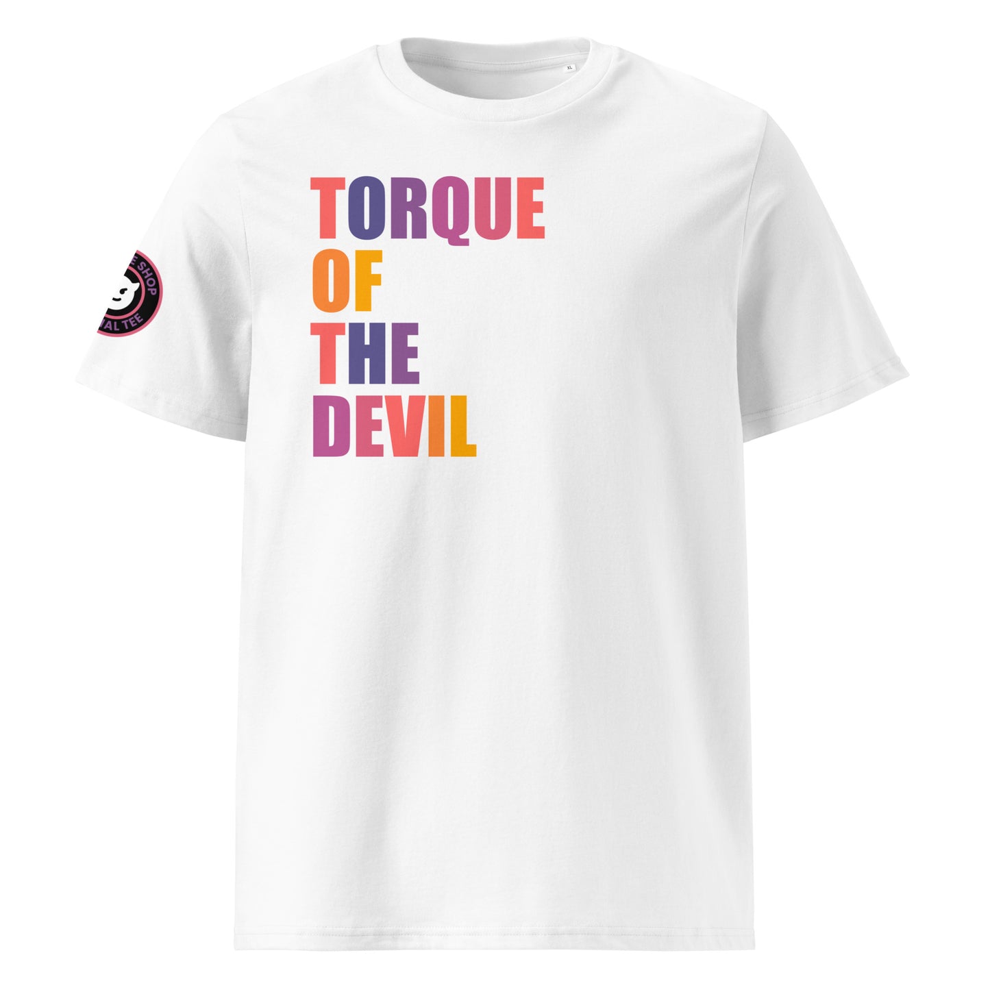 Front view of white unisex t-shirt with “TORQUE OF THE DEVIL” slogan in multi-colour harlequin print. DTF print, perfect for car meets, torque fans, and car banter.