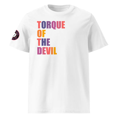 Front view of white unisex t-shirt with “TORQUE OF THE DEVIL” slogan in multi-colour harlequin print. DTF print, perfect for car meets, torque fans, and car banter.