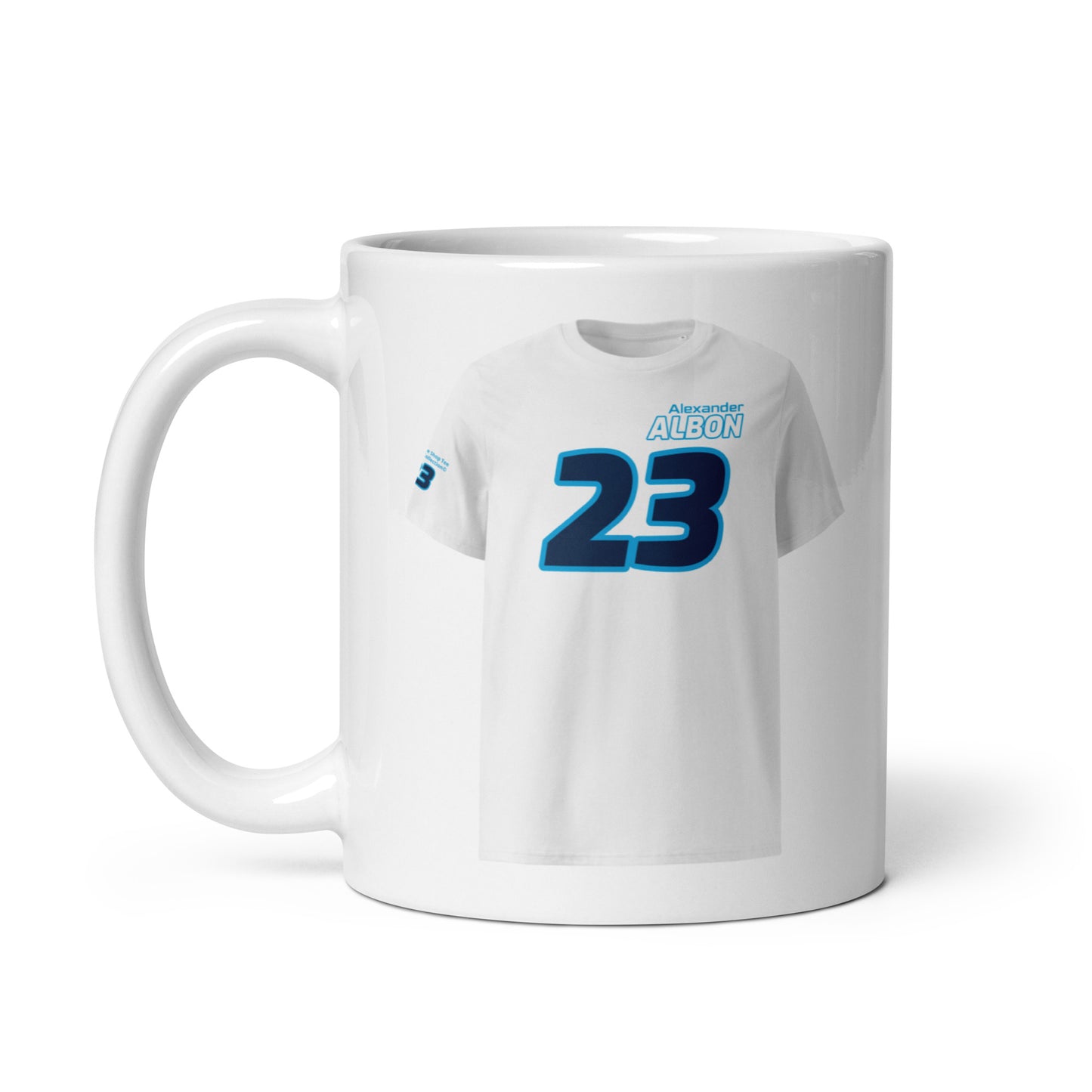 A white ceramic TeeMug© featuring a Williams team colors design with "Alexander Albon" in bold letters and the number "23". The mug is shown with the handle on the left side.
