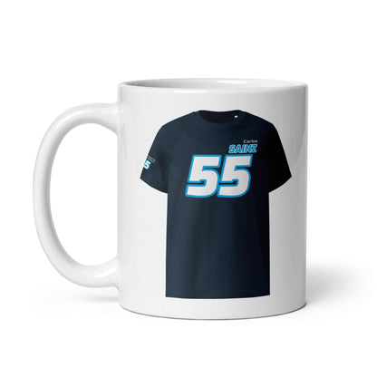 A white ceramic TeeMug© featuring a blue and white design with "Carlos Sainz" in bold letters and the number "55". The mug is shown with the handle on the left side.