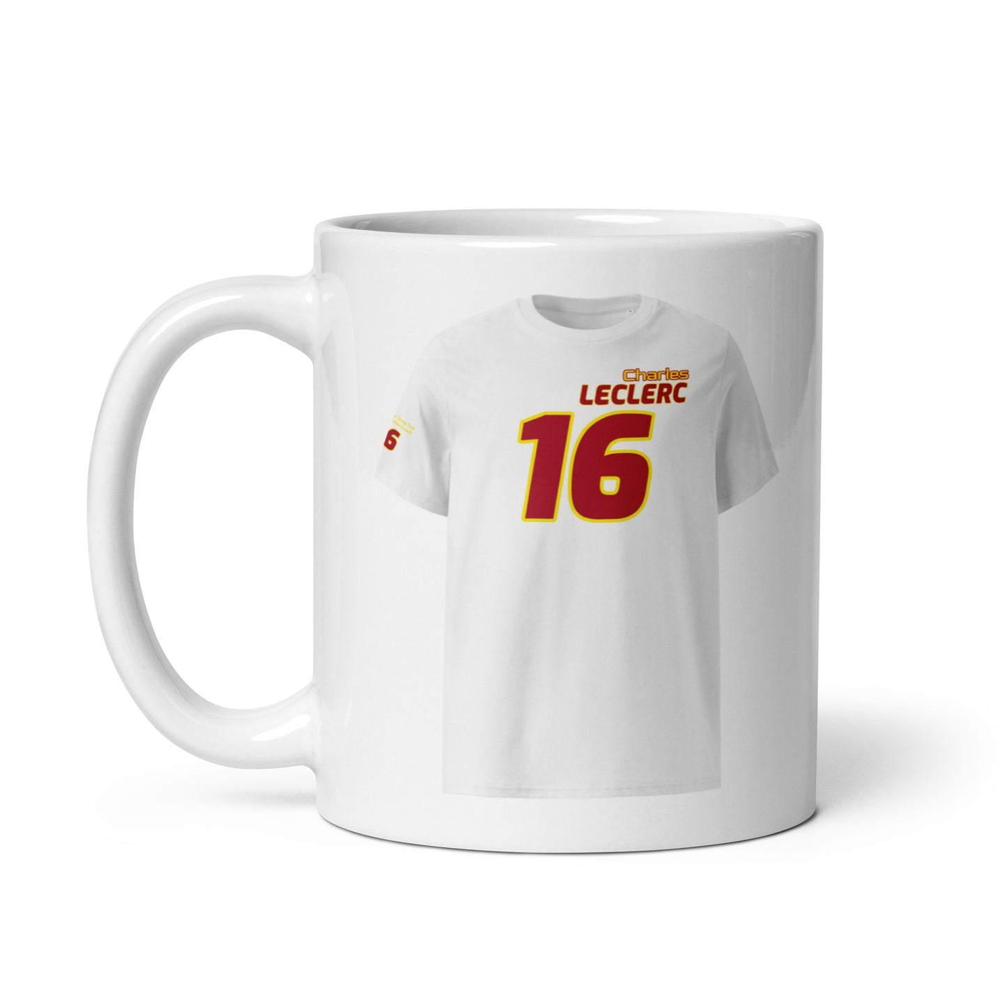 A white ceramic TeeMug© featuring a Scuderia Ferrari red and yellow design with "Charles LECLERC" in bold letters and the number "16". The mug is held by a handle on the left side.