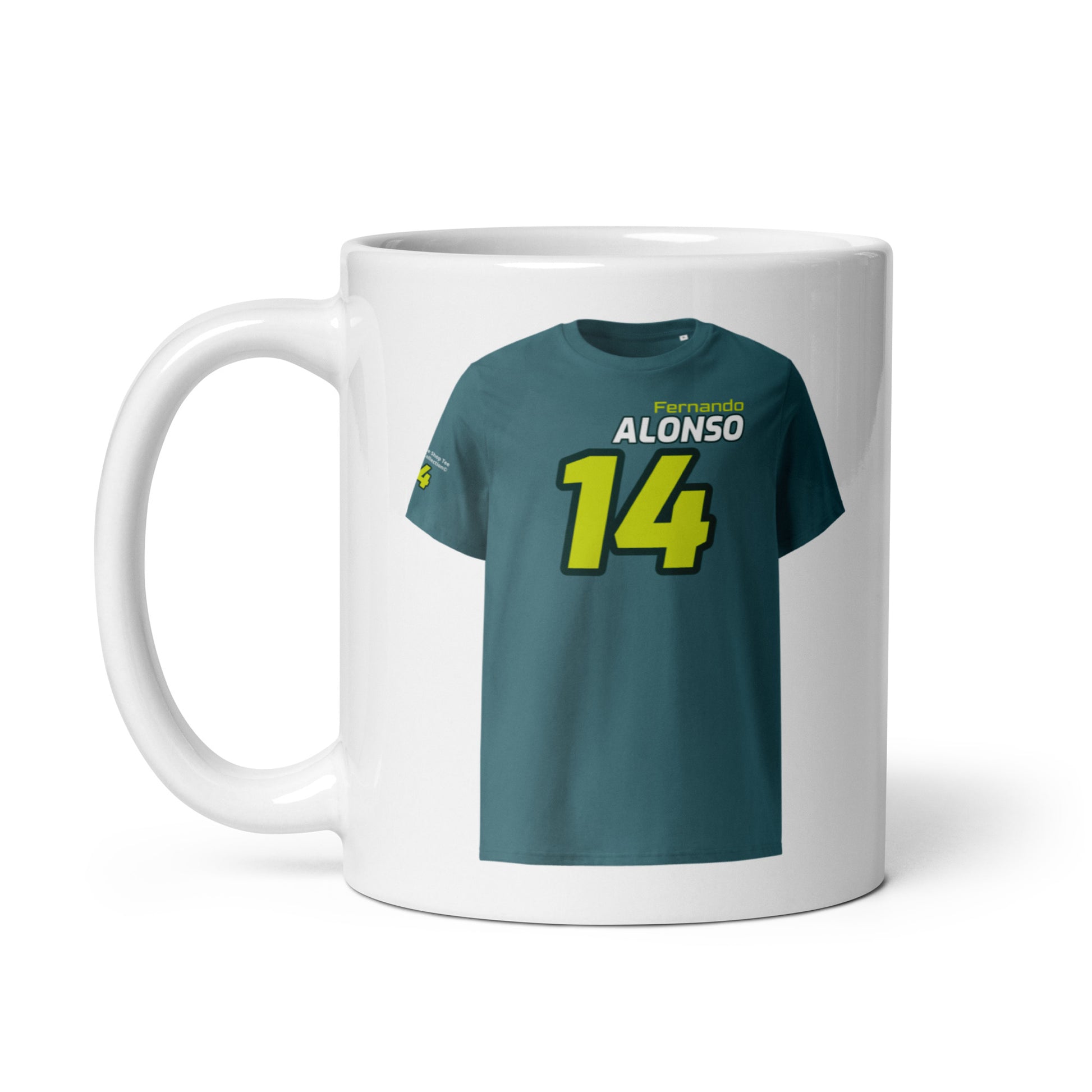 A white ceramic TeeMug© featuring a teal and yellow design with "Fernando ALONSO" in bold letters and the number "14". The mug is held by a handle on the left side.