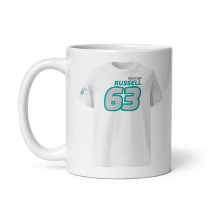 A white ceramic TeeMug© featuring a teal and black design with "George RUSSELL" in bold letters and the number "63". The mug is held by a handle on the left side.