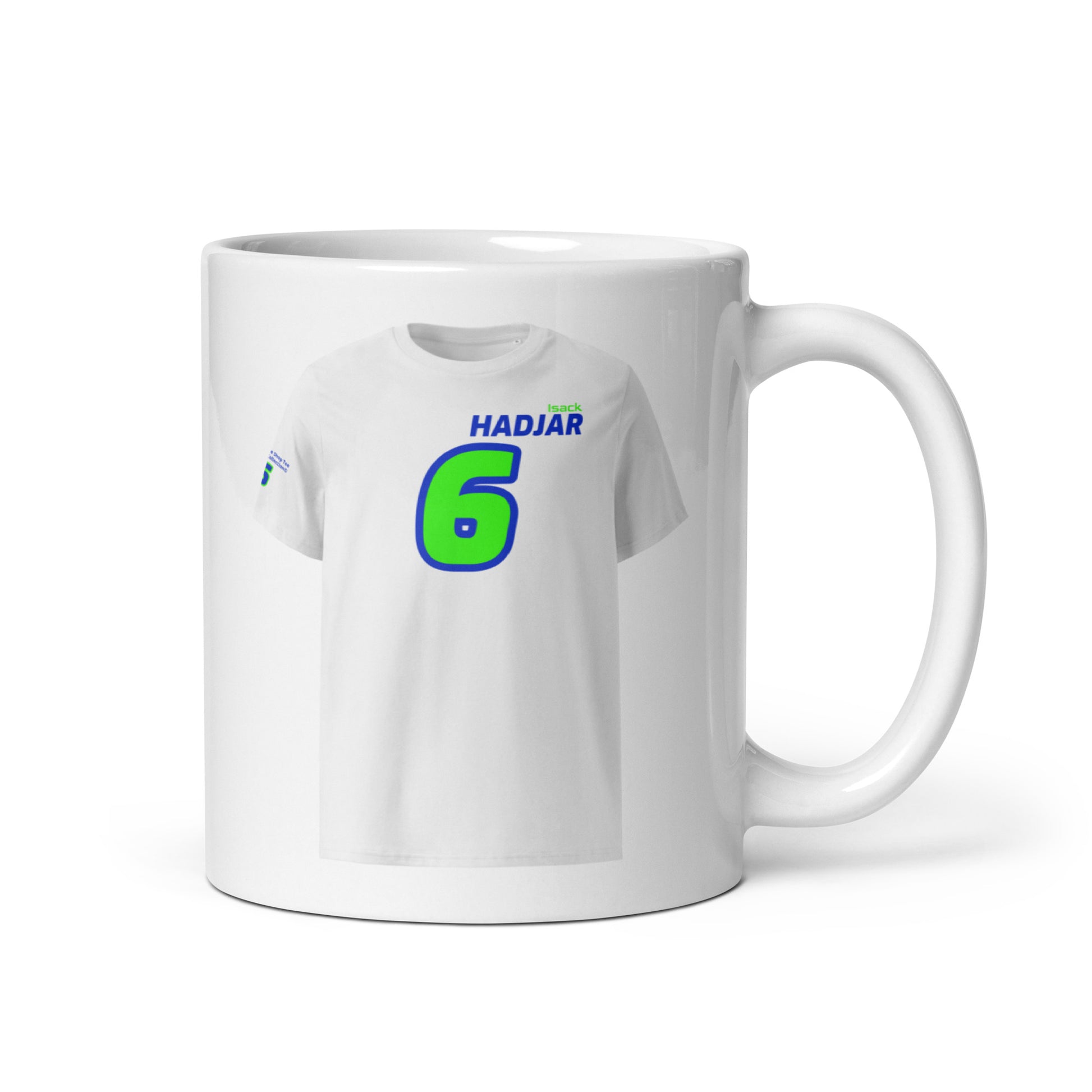 A white ceramic TeeMug© featuring a blue and green design with "HADJAR" in bold letters and the number "6". The mug is shown with the handle on the right side.
