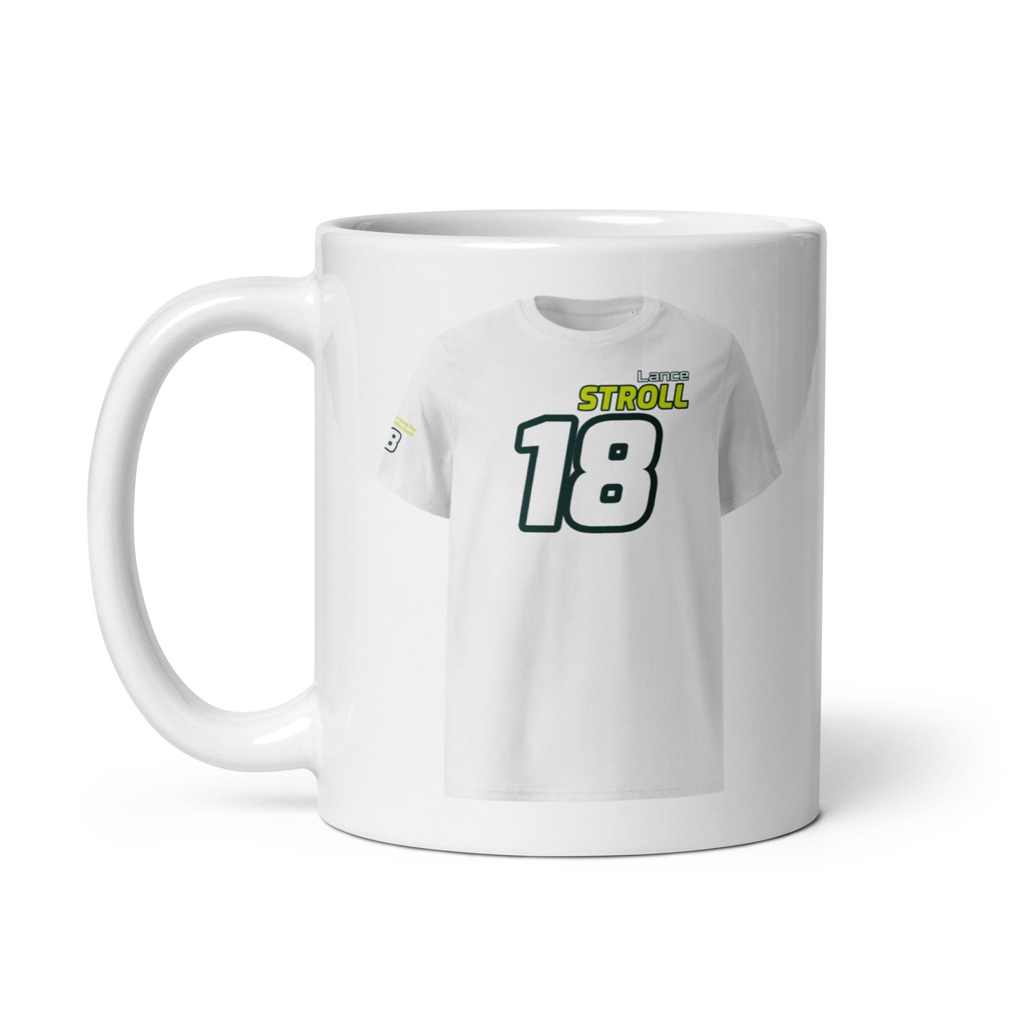 A white ceramic TeeMug© featuring a green and yellow design with "Lance STROLL" in bold letters and the number "18". The mug is held by a handle on the left side.