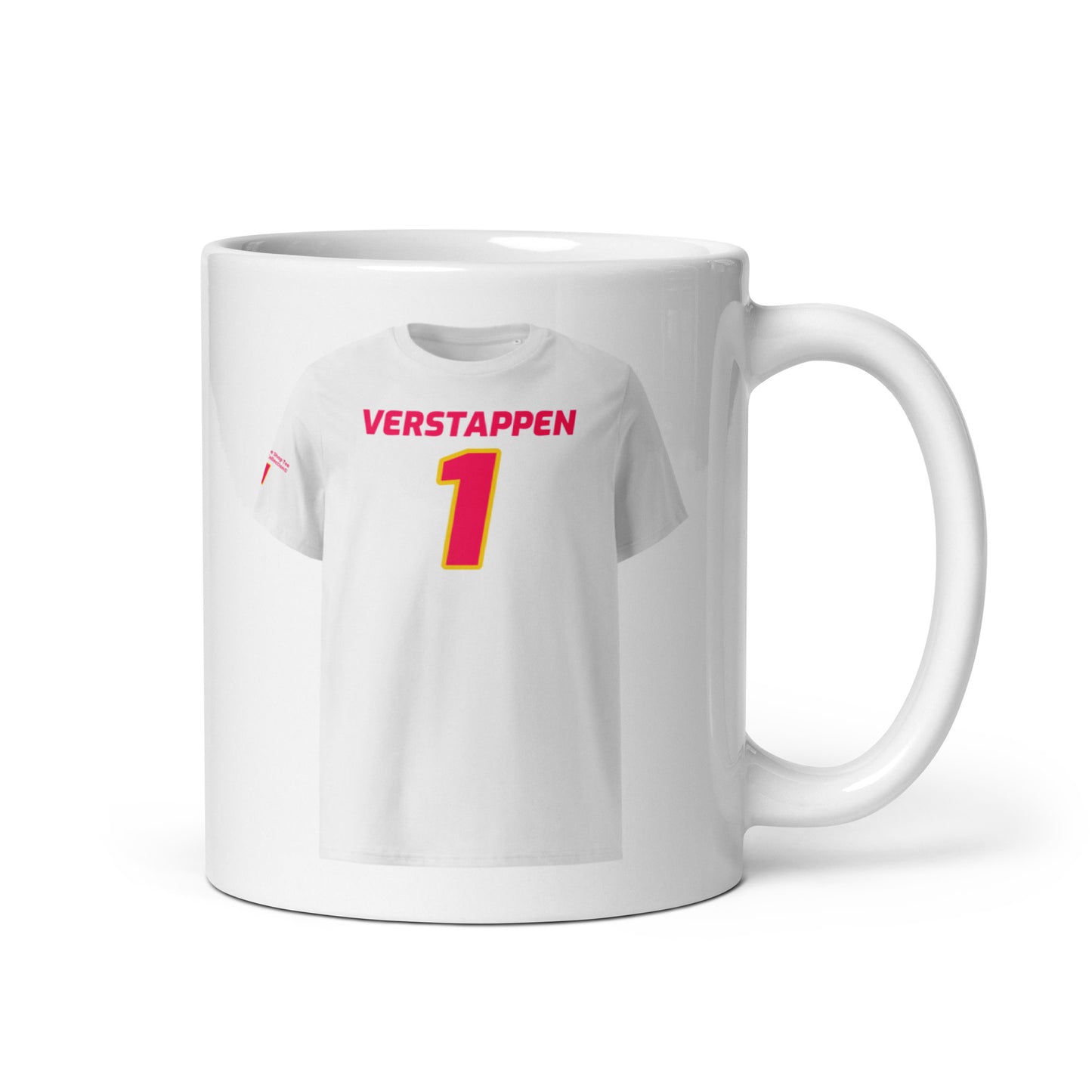 A white ceramic TeeMug© featuring a Red Bull pink design with "VERSTAPPEN" in bold letters and the number "1". The mug is held by a hand on the right side.

