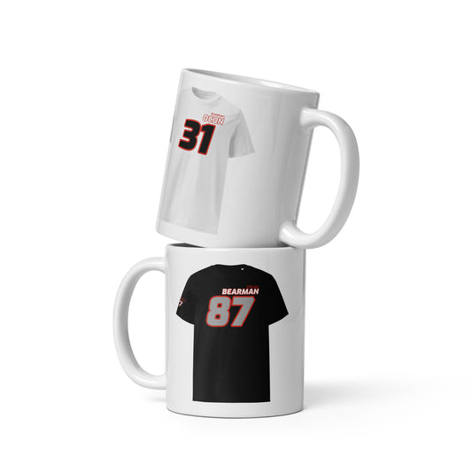The Teemug© featuring Haas drivers Oliver Bearman and Esteban Ocon. The mug showcases their names and numbers in bold colours, with Bearman's black and white design and Ocon's white and black design. Perfect for motorsport fans and collectors.