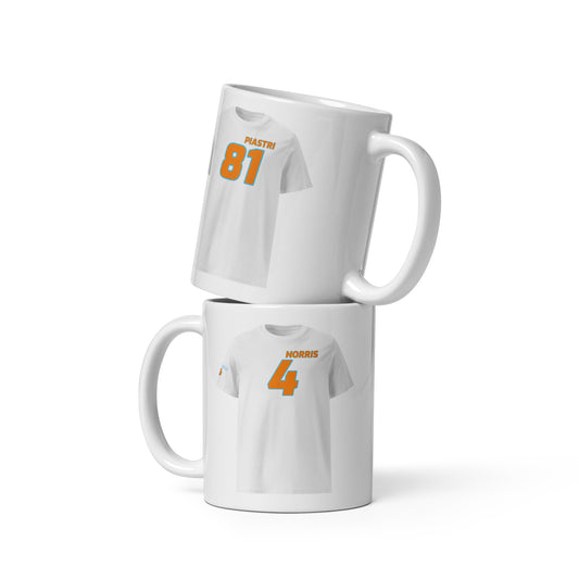The Teemug© featuring McLaren's dynamic duo, Piastri and Norris. The mug showcases their names and numbers in Papaya McLaren racing colors with Gulf blue accents. Perfect for motorsport fans and collectors.
