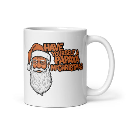 View of 11oz white mug with a papaya Christmas message and handle on right. Perfect for Mclaren fans.