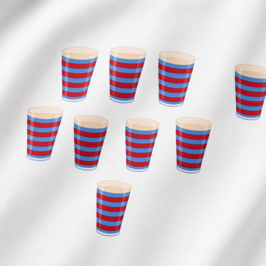 Close-up of the vintage Blackheath Team Pints t-shirt print showing multiple small red and light blue striped pint graphics on white fabric for rugby match day supporters