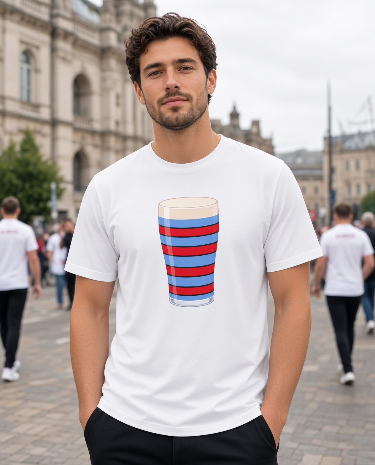 Male model wearing a white vintage Blackheath rugby Mega Pint t-shirt with a red and light blue striped pint glass graphic, ideal for Blackheath match days in South East London and England supporters