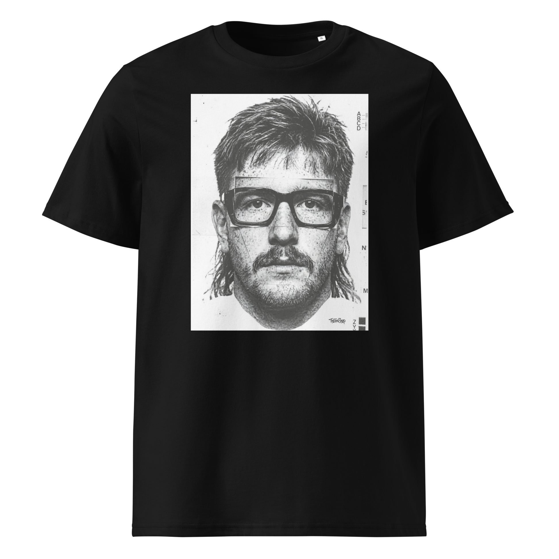 Black t-shirt front view featuring an illustrated portrait inspired by a modern rugby lock wearing black glasses with a “what you looking at?” expression