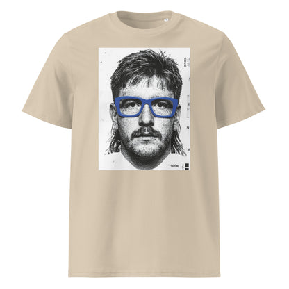 Desert dust t-shirt front view featuring an illustrated portrait inspired by a modern rugby lock wearing bold blue glasses with a “what you looking at?” expression