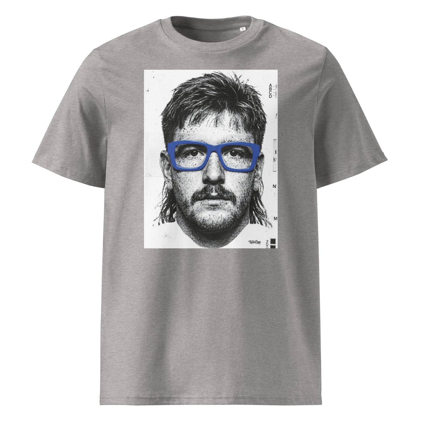 Grey t-shirt front view featuring an illustrated portrait inspired by a modern rugby lock wearing bold blue glasses with a “what you looking at?” expression