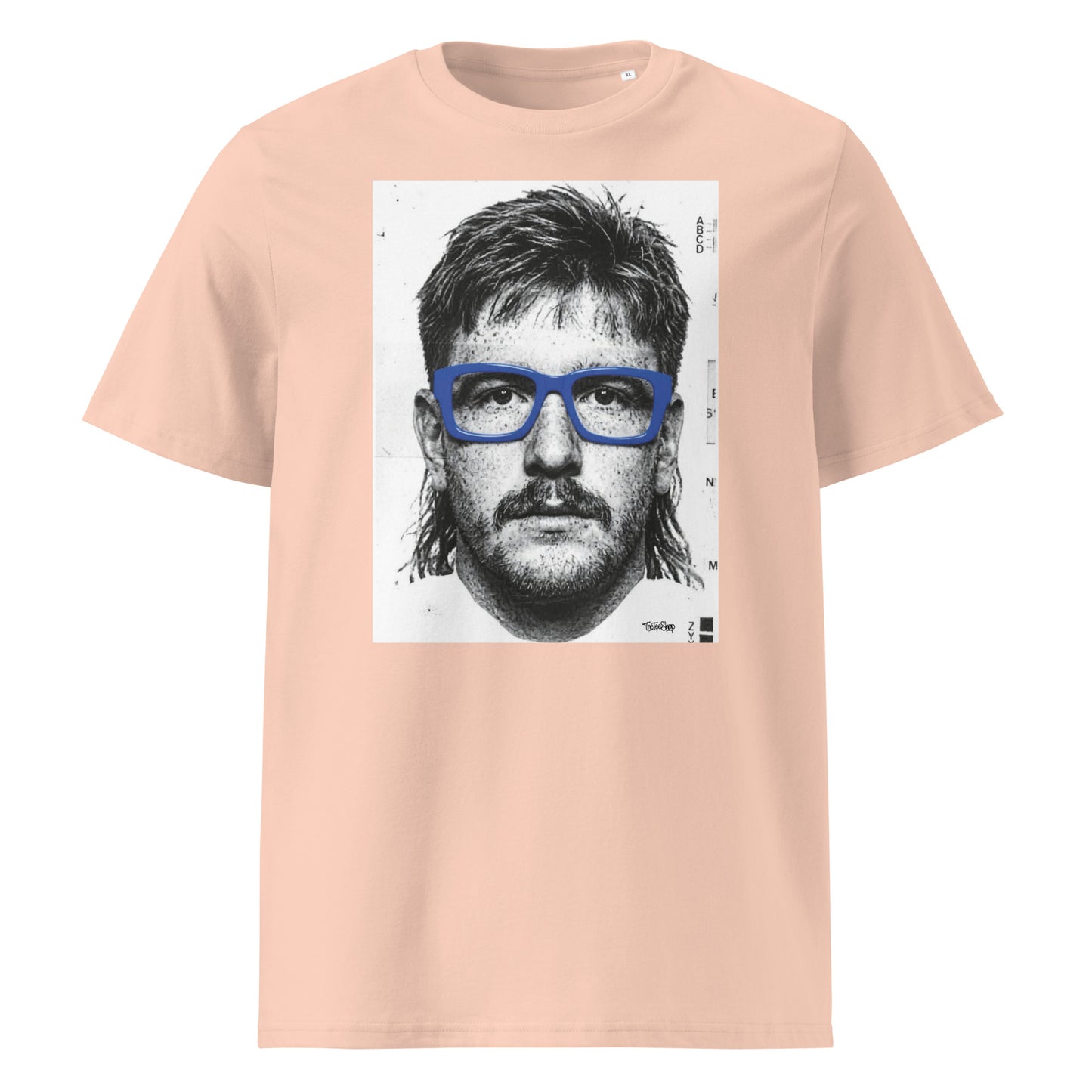 Peche t-shirt front view featuring an illustrated portrait inspired by a modern rugby lock wearing bold blue glasses with a “what you looking at?” expression