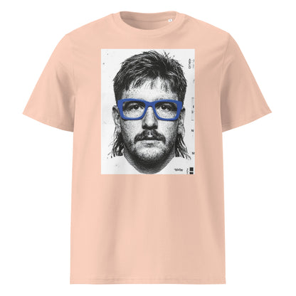 Peche t-shirt front view featuring an illustrated portrait inspired by a modern rugby lock wearing bold blue glasses with a “what you looking at?” expression