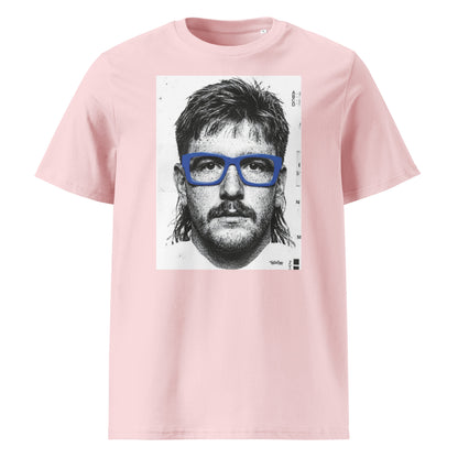 Pink t-shirt front view featuring an illustrated portrait inspired by a modern rugby lock wearing bold blue glasses with a “what you looking at?” expression