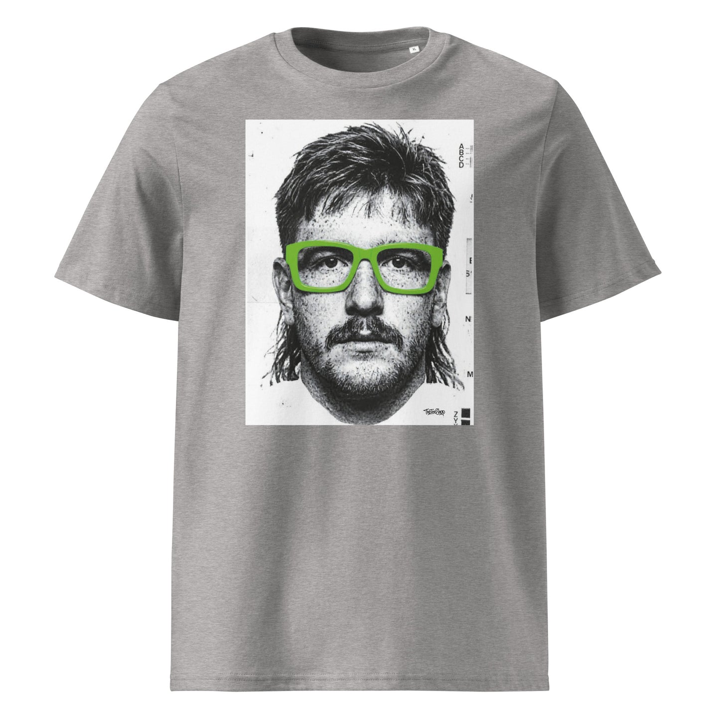 Grey t-shirt front view featuring an illustrated portrait inspired by a modern rugby lock wearing bold green glasses with a “what you looking at?” expression