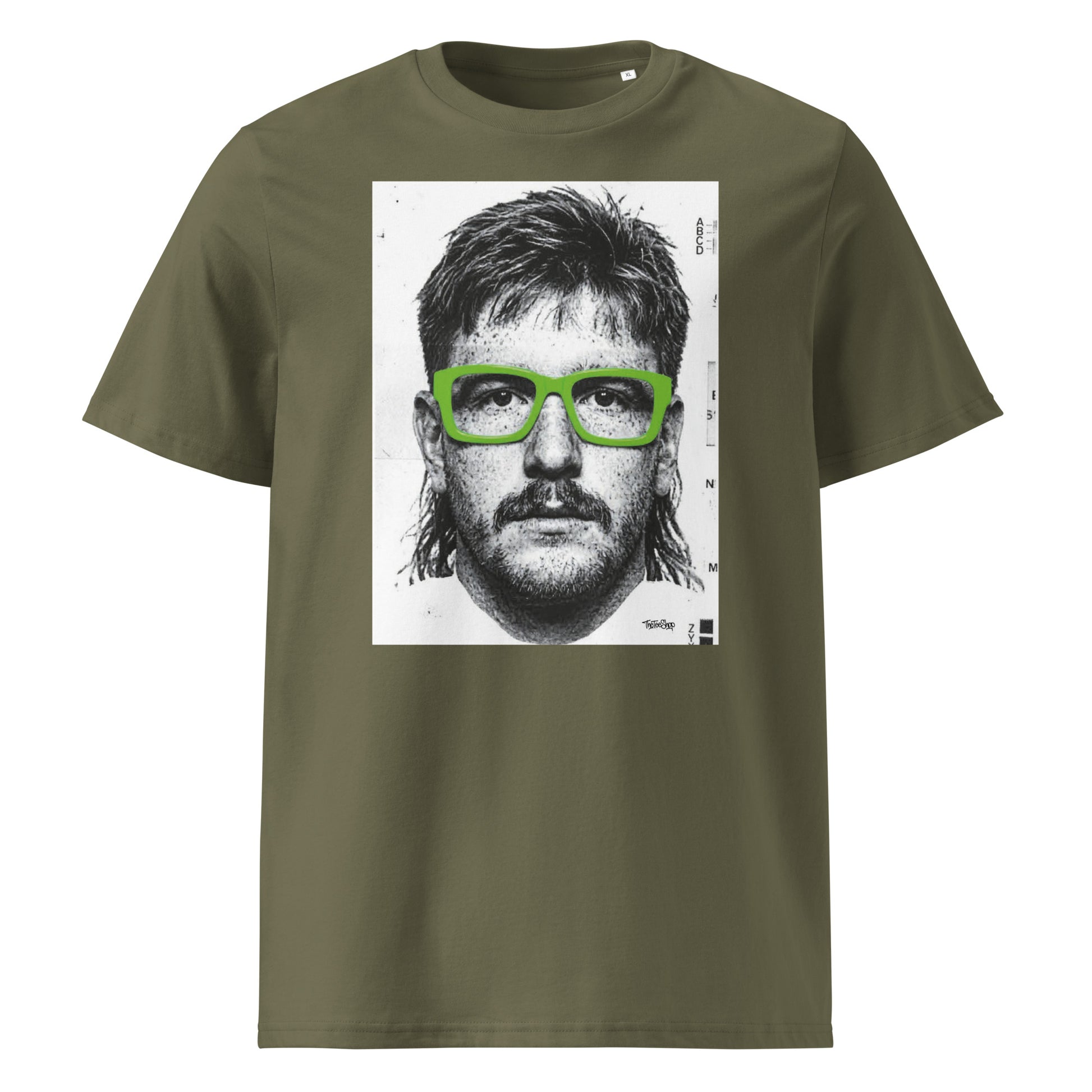 Khaki green t-shirt front view featuring an illustrated portrait inspired by a modern rugby lock wearing bold green glasses with a “what you looking at?” expression