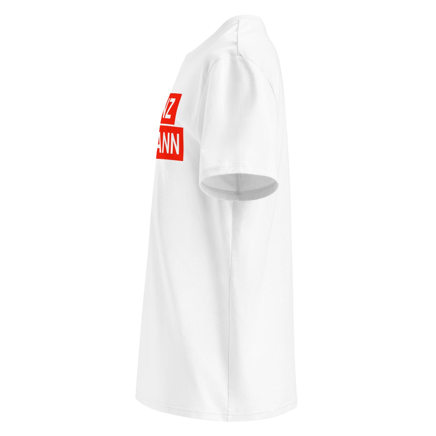 Left side view of white "FRANZ HERMANN" meme t-shirt, showing orange block lettering and round TheTeeShop sleeve logo. Perfect for F1 and GT3 racing fans.