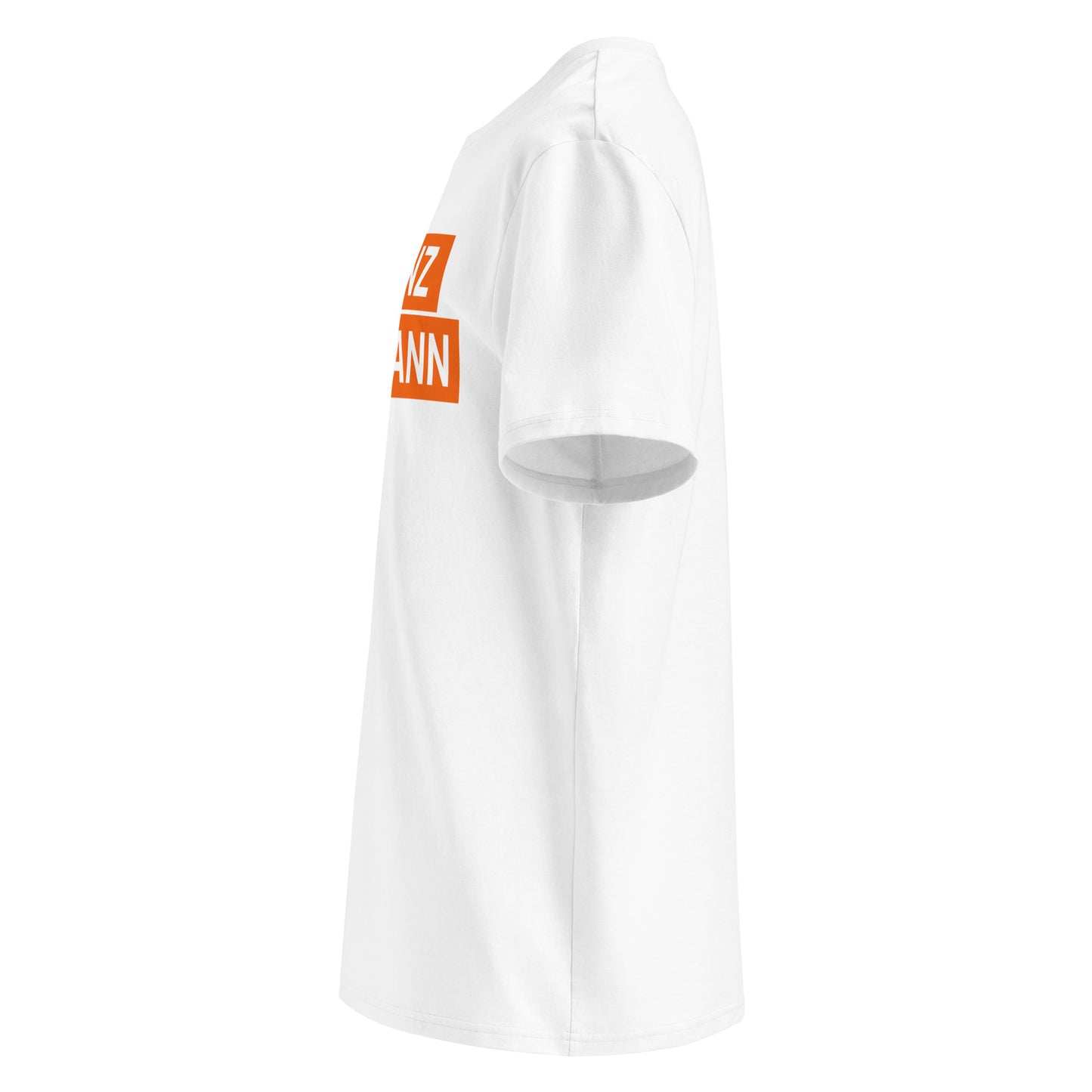 Left side view of white "FRANZ HERMANN" meme t-shirt showing orange block lettering and round TheTeeShop sleeve logo. Perfect for F1 and GT3 racing fans.