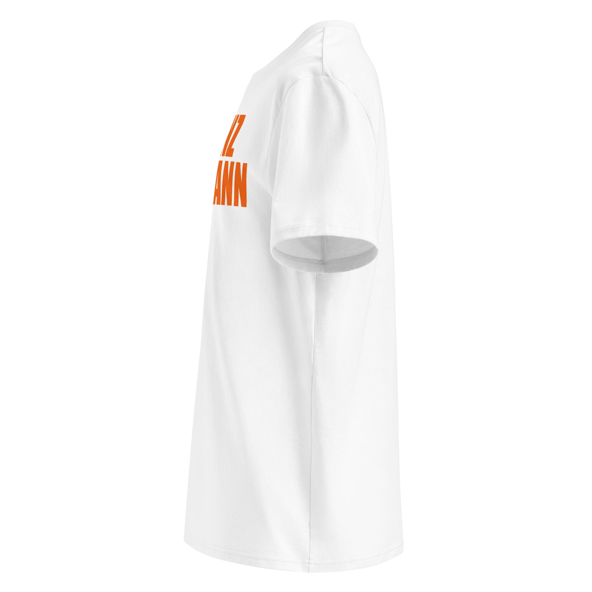 Left side of white FRANZ HERMANN t-shirt, orange block lettering, right sleeve with TheTeeShop logo, designed for F1 and Dutch Max fans.