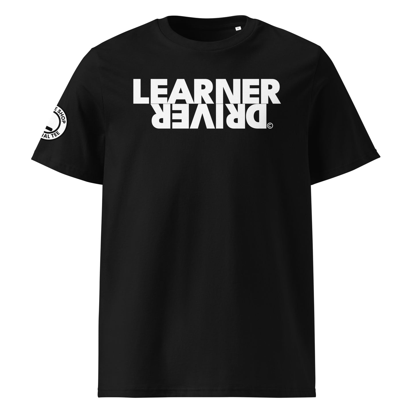 Black organic cotton t-shirt with bold white “LEARNER DRIVER” text printed upside down on the front, right sleeve logo, perfect for car meet fans and new drivers, front view.
