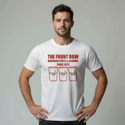 Man wearing a white Ulster rugby t-shirt with red text and graphics on a grey background