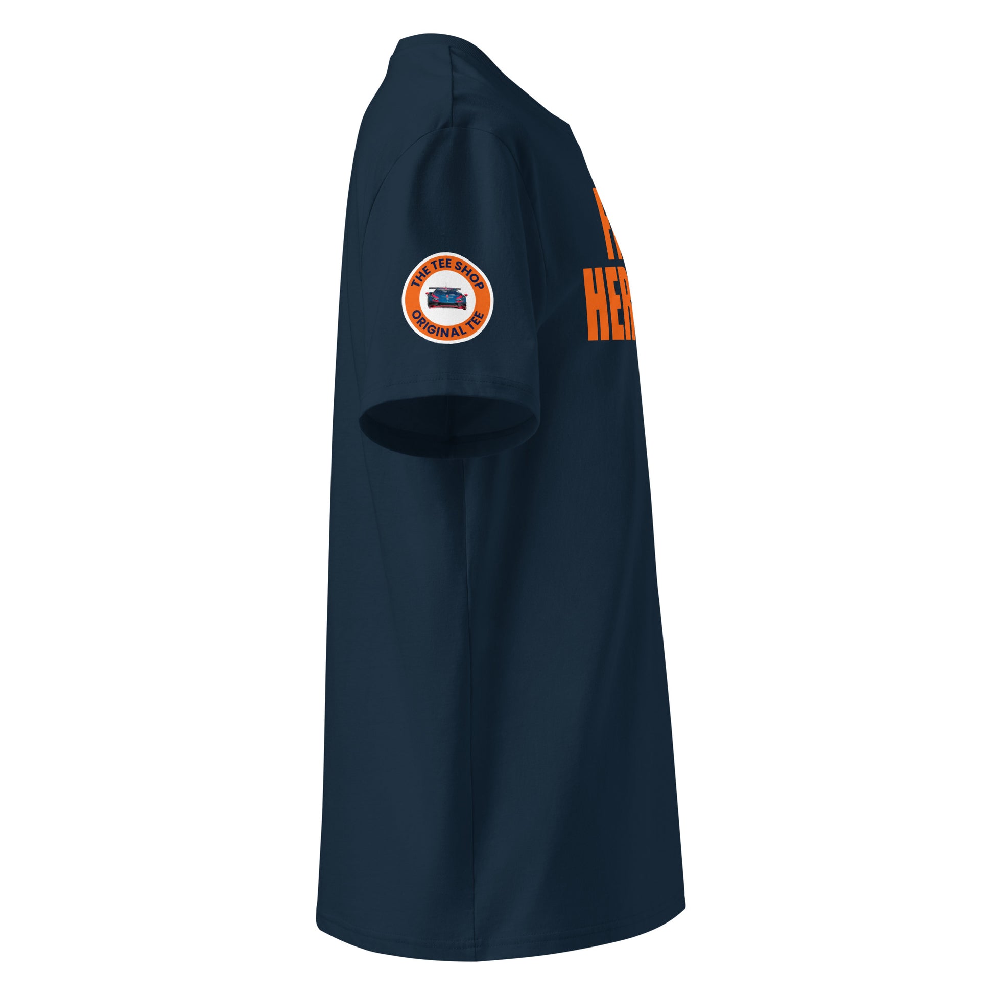 Right side view of navy FRANZ HERMANN t-shirt, orange lettering, round logo on right sleeve, for motorsport and meme collectors.