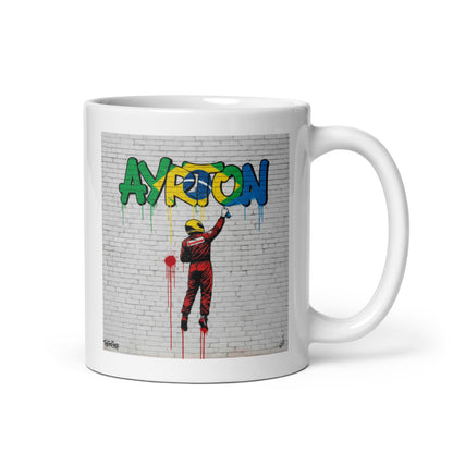 11oz white Ayrton Senna graffiti mug with handle on right.