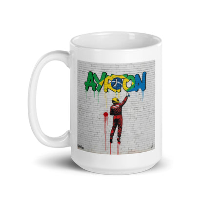 15oz white Ayrton Senna graffiti mug with handle on left.