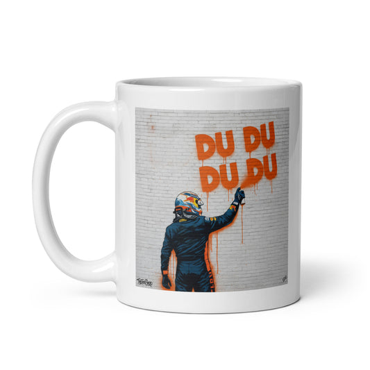 11oz ceramic mug featuring street art depicting Max Vertappen and the iconic DU DU DU DU song a Max fan favourite. Handle on left.
