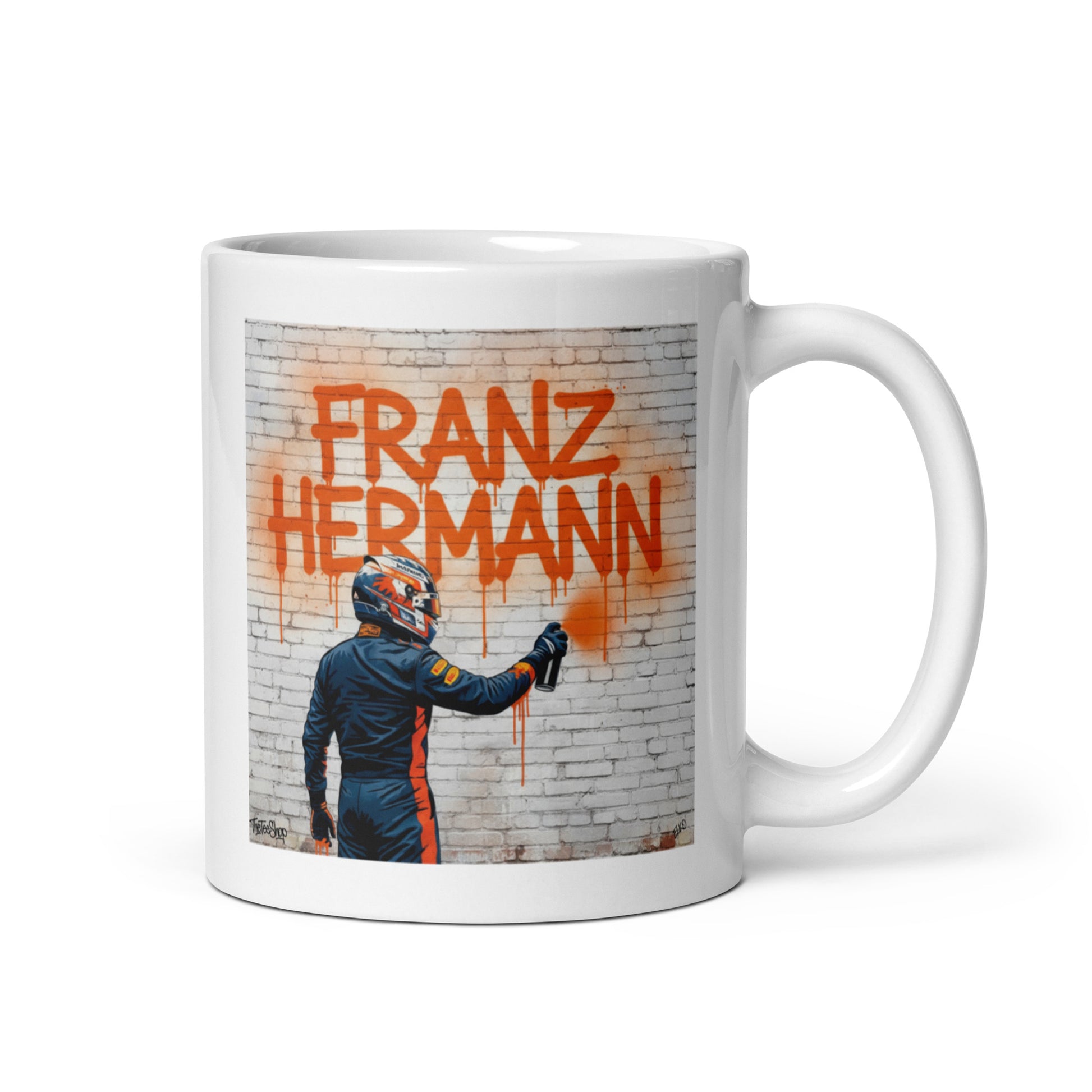 11oz white mug with Franz Hermann displayed in a street art way. Handle on right side