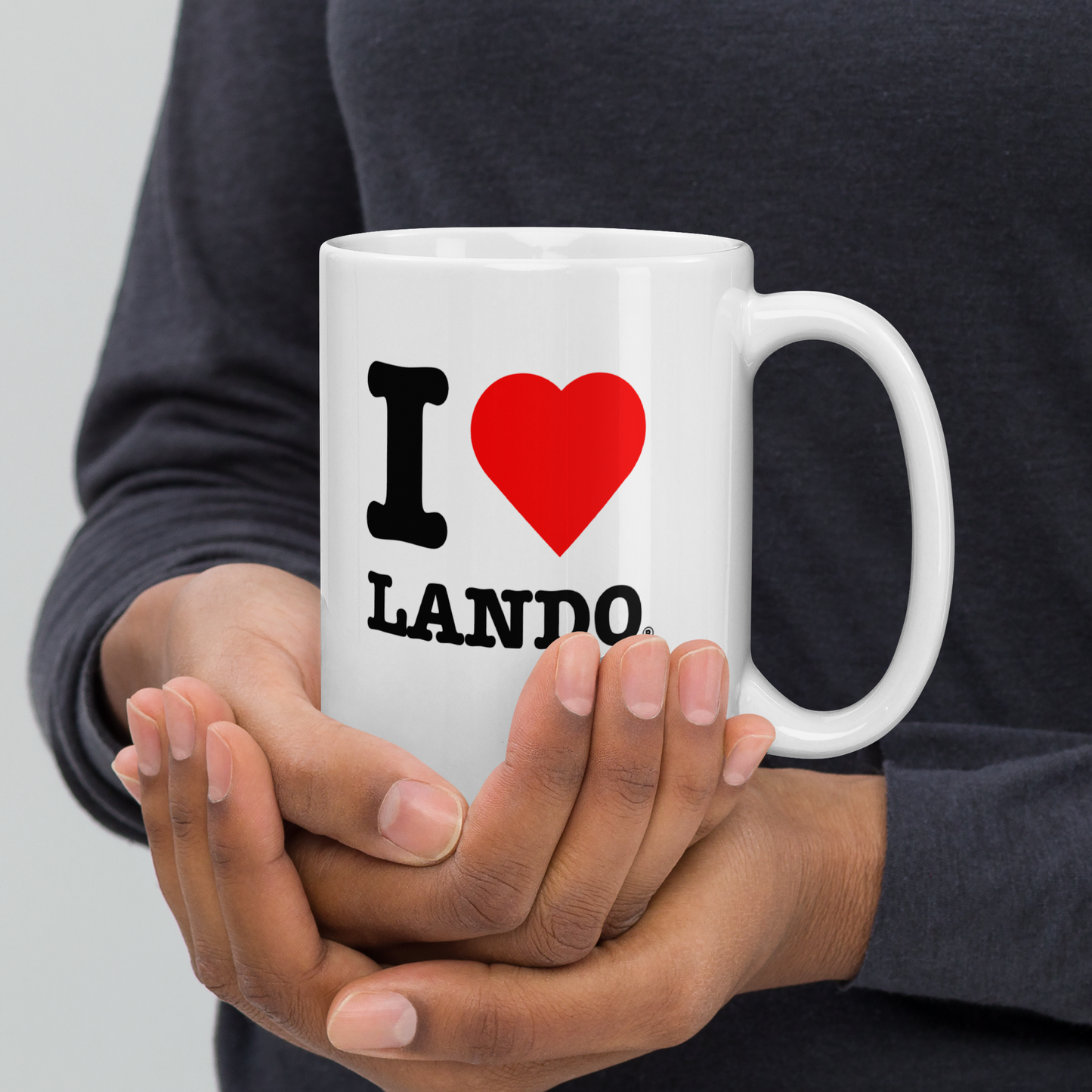 Person holding a white mug with 'I ❤️ LANDO' text. Perfect gift for lanso norris fans.