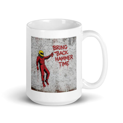 a white 15oz mug with Hammer Time on it. Handle on right.